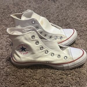 Converse men’s Classic White High-Top athletic sneakers.